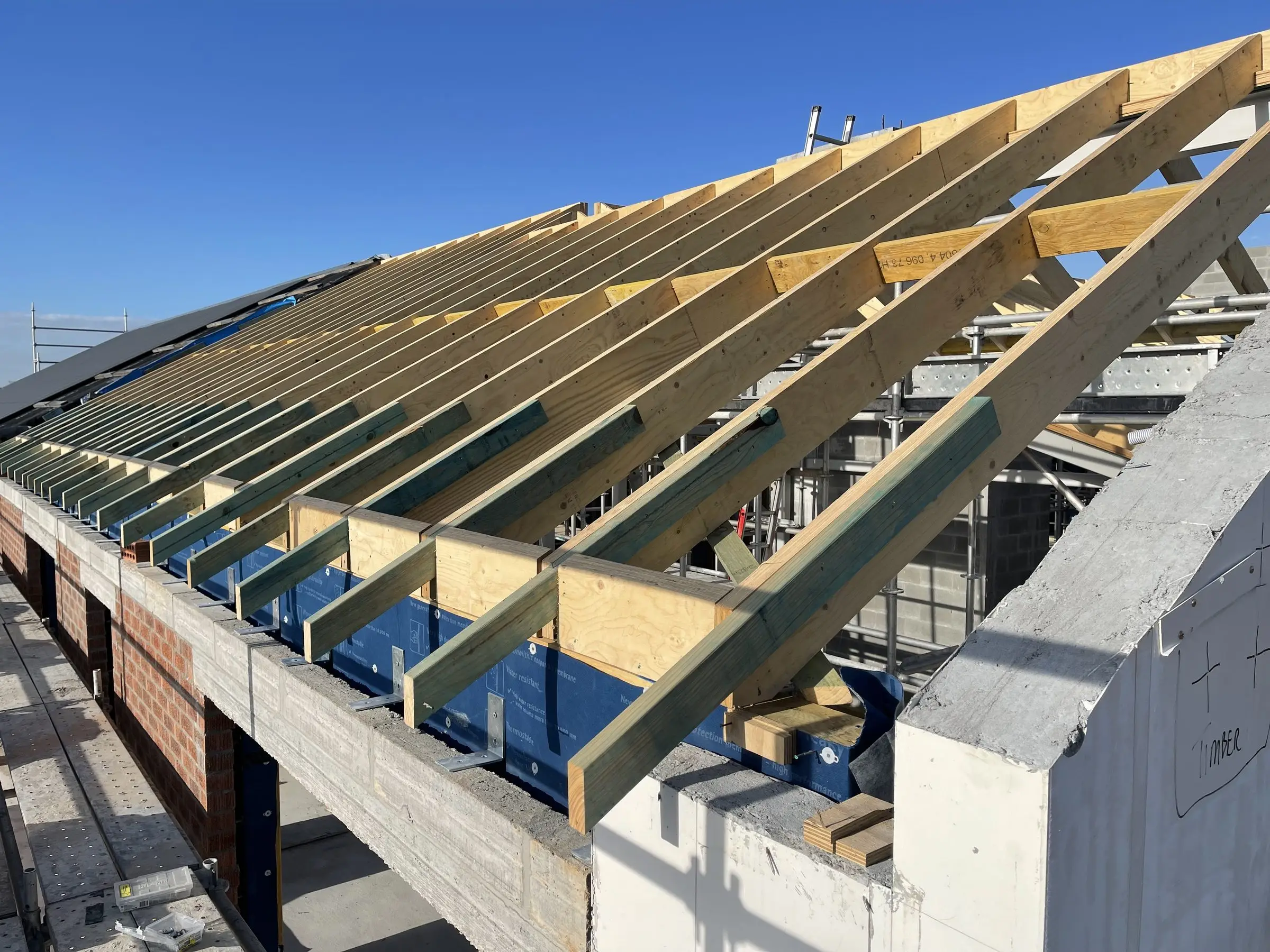 Roof trusses and structural steel installed on a Hunter region build